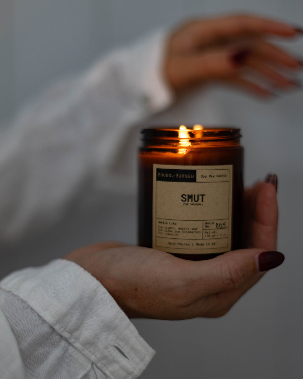 candle held in hands