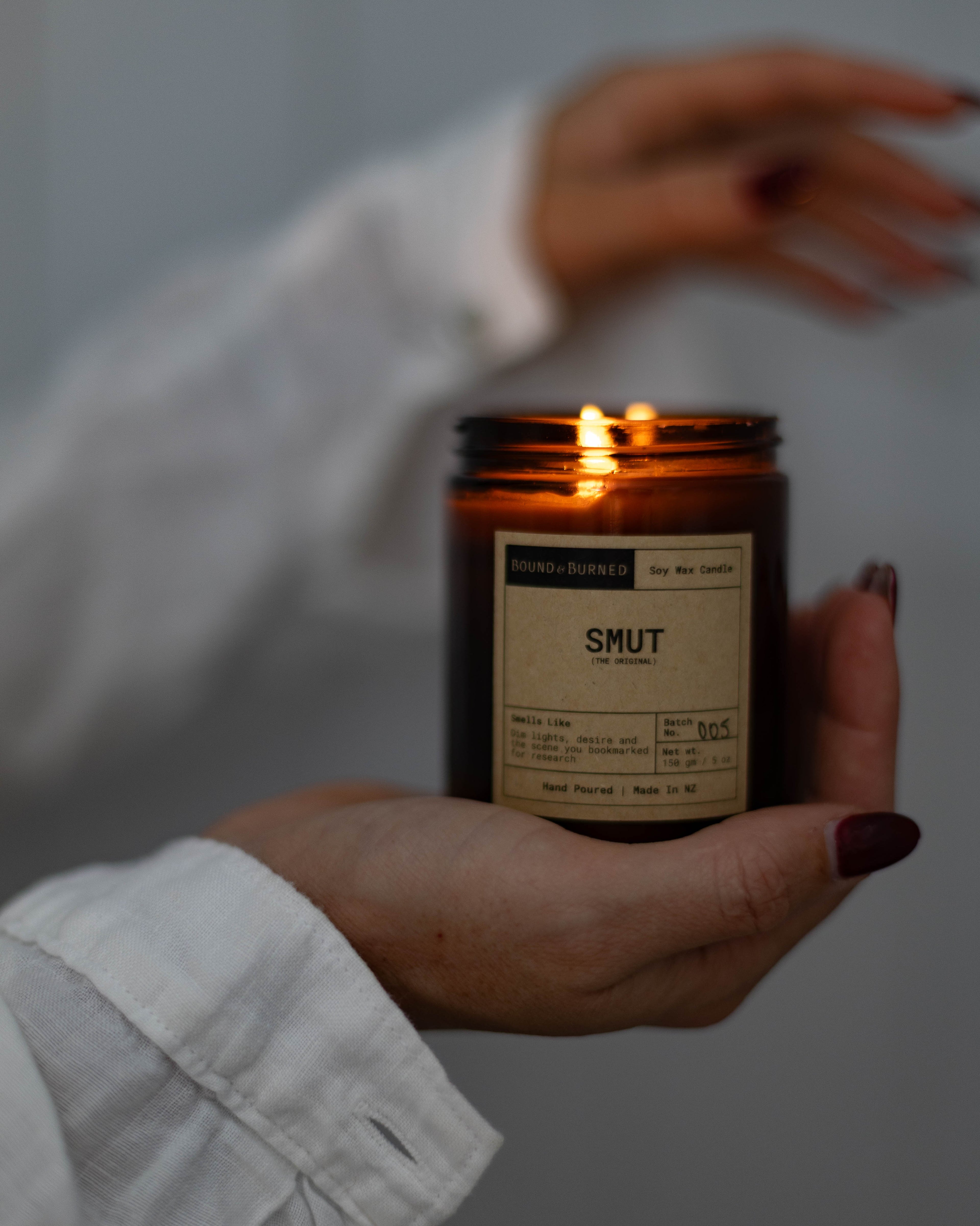 candle held in hands